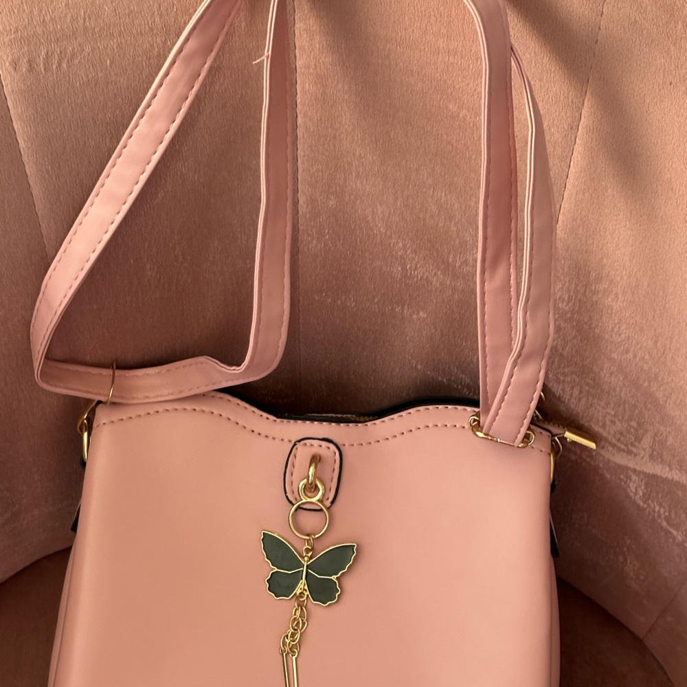 Elegant Pink Shoulder Bag with Butterfly Charm